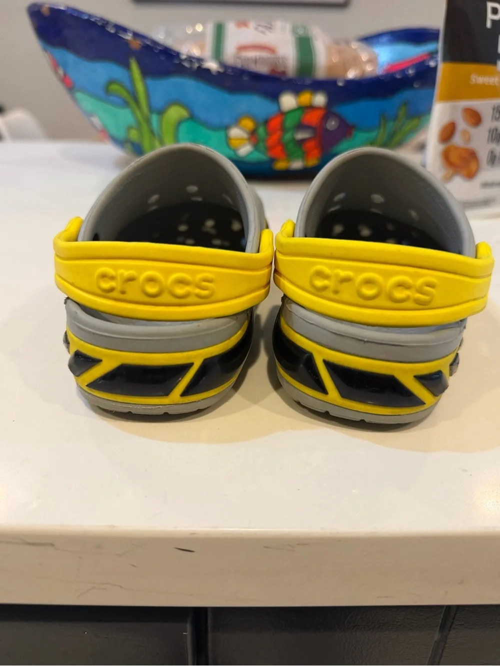 CROCS Kids Gray Clogs with Yellow Heel Strap